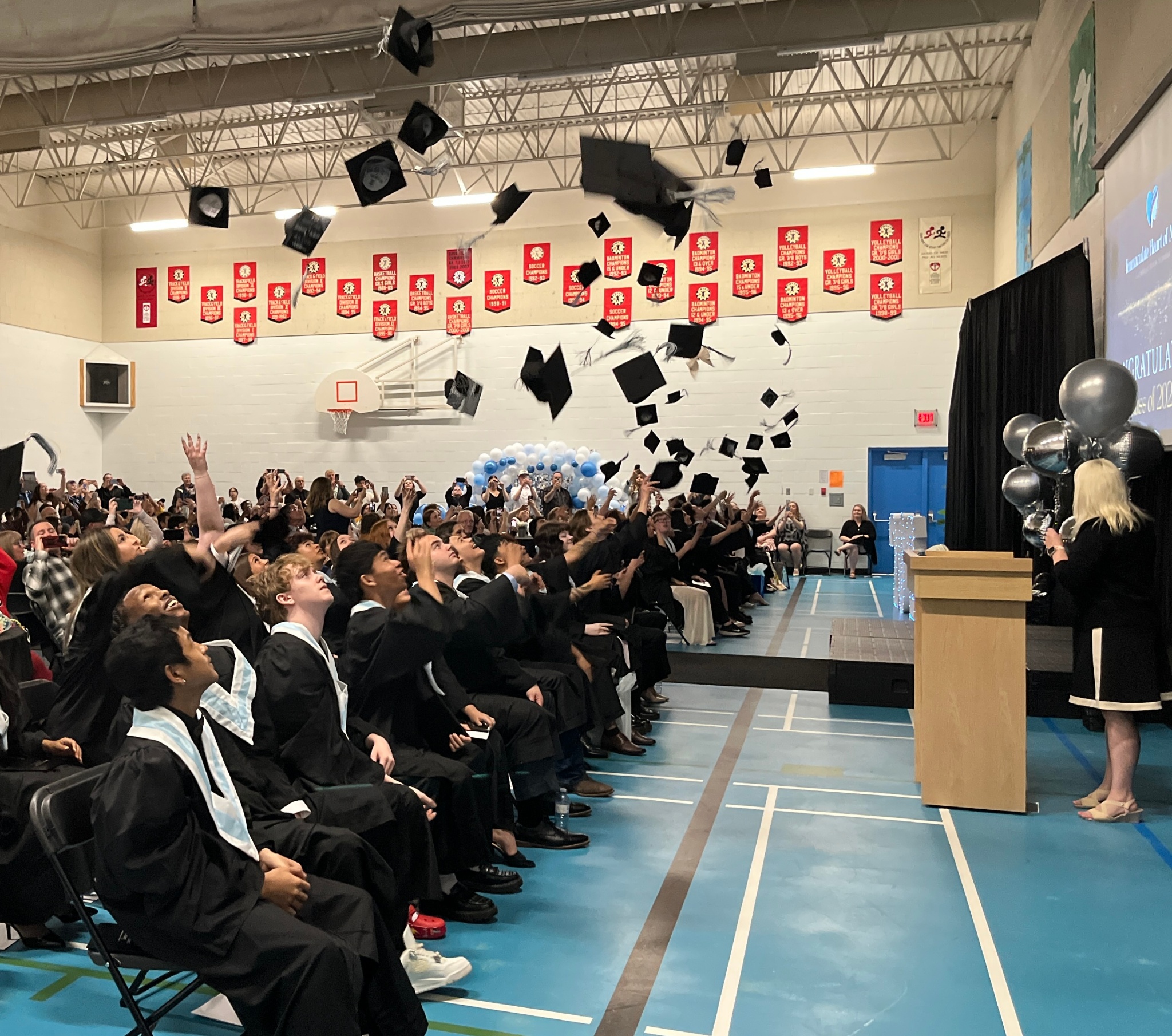 Immaculate Heart of Mary graduation cap toss